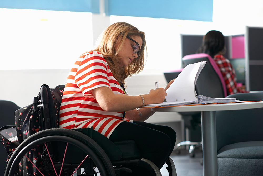 Young student in a wheel-chair learning from our evidence-based courses.